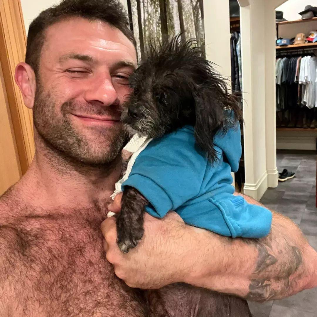 Lee Asher with one of his rescued dogs
